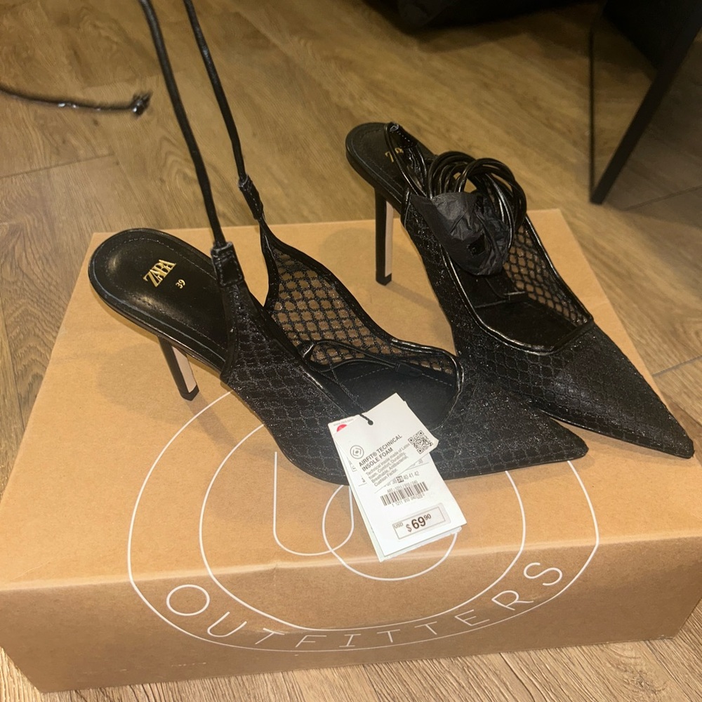 Zara black pointed heels that wrap around the ankle.